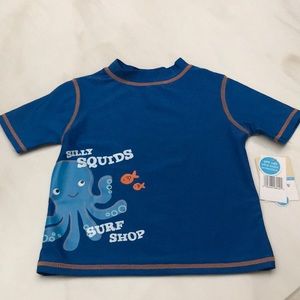 NWT Carter’s swimshirt Size 24 mo